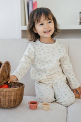 Toddler girl in Avauma Sky Blossom pajama set – breathable floral sleepwear for baby girls